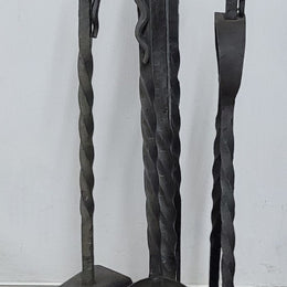 Distinctive vintage arts and craft heavy hand wrought fire set, it has 4 tools on a lovely base. Circa 1930's. In great original condition