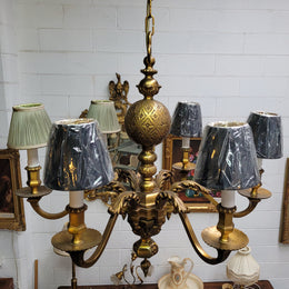 Stunning six arm French bronze chandelier. It can be used with or without shades. It has been fully rewired to Australian standards. It is in good original detailed condition.