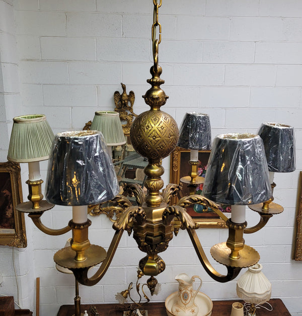 Stunning six arm French bronze chandelier. It can be used with or without shades. It has been fully rewired to Australian standards. It is in good original detailed condition.