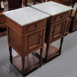 Antique French Oak Henry II white marble top bedside cabinets. They have one drawer and cupboard a long with an open shelf at the bottom. Sourced from France and in good original detailed condition.