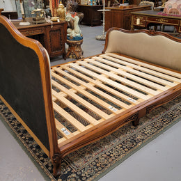French Louis XV style queen size upholstered bed. Upholstery is in good condition and bed is complete with custom made slats. Just place your mattress on top.