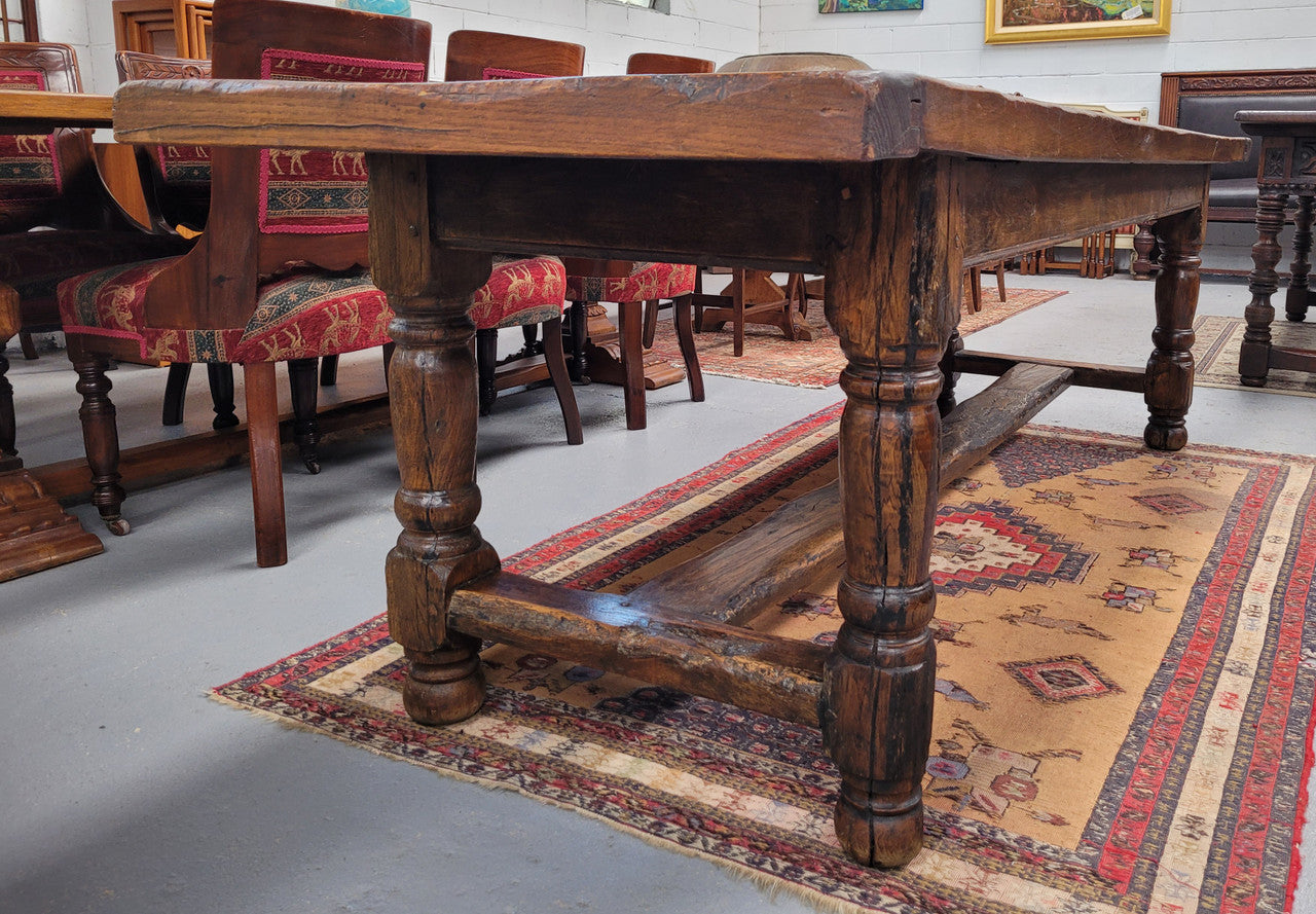 Large impressive 19th century 2.5 meter Antique French Oak farmhouse table. Loads of character with a stunning solid thick top and has a long drawer at one end. Sourced from France and in good original detailed condition.