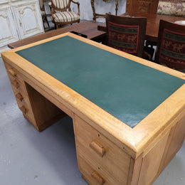 Parliament house desk made from Queensland maple. Desk has room numbers stamped to front. It's in good original condition. Purchased from a sale in old Parliament House in the late 1980's.