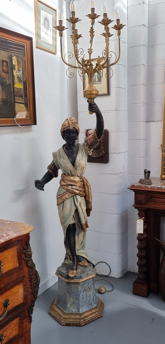 19th Century French Blackamoor lamp of grand proportions. Made from carved wood painted & gilded. It has been fully rewired to Australian standards.