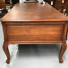 French Oak Louis XV style full partners desk with both sides having five functional drawers. In very good original detailed condition.
