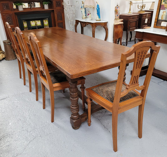 Amazing French Oak stretcher base Farmhouse table. It can comfortably sit eight people and is in good original detailed condition.