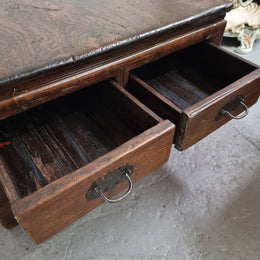 Square Elm coffee table with oriental legs and two long drawers.  Beautifully finished and in good original condition. It has been sourced from France.