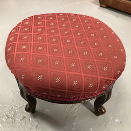Upholstered Antique Mahogany round foot stool with beautiful carved feet. In very good original condition.