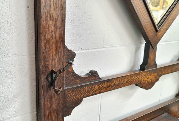 Beautiful Oak Antique Jacobean hall stand, with barley twist leg and a drawer for storage in very good original detailed condition condition.