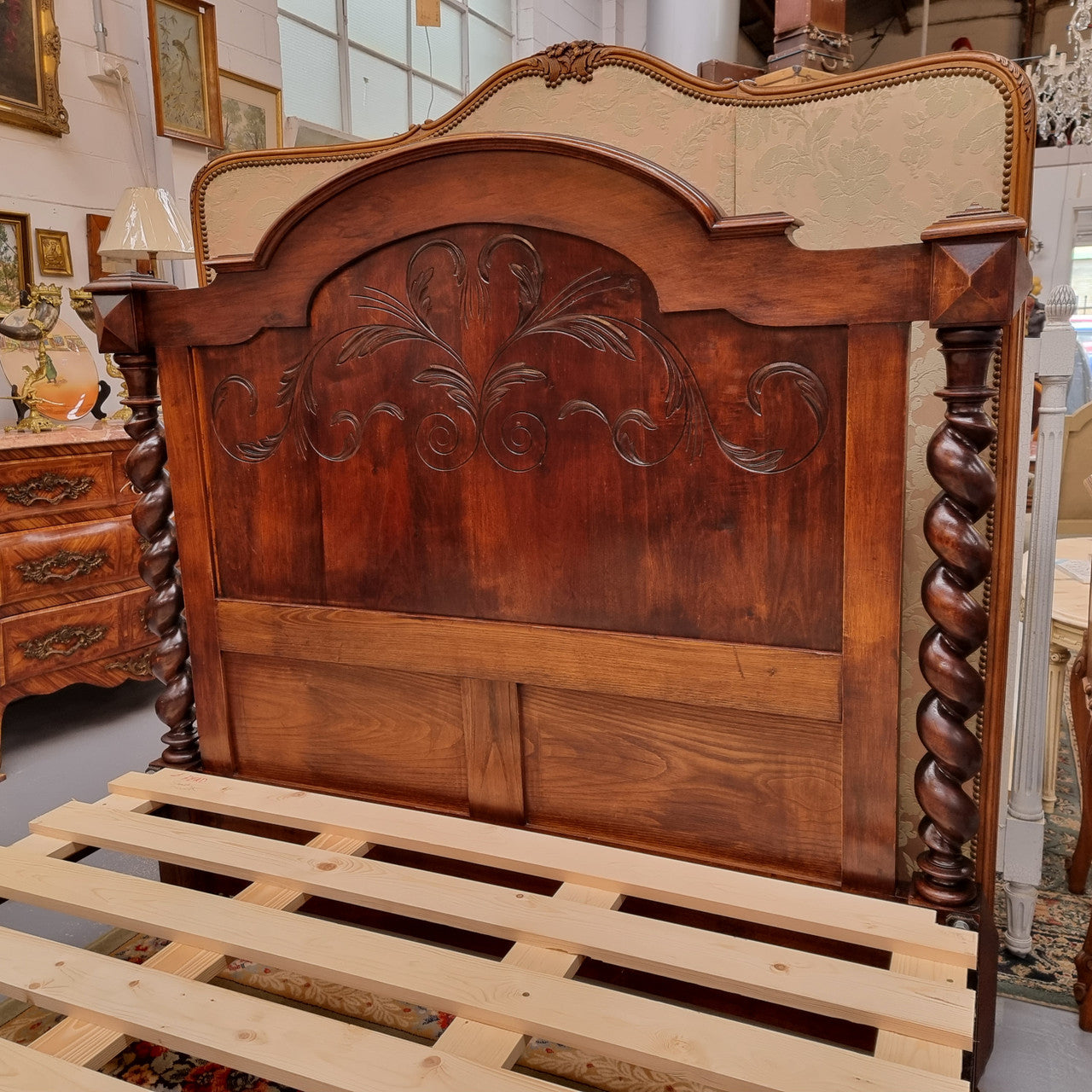 French 19th Century Walnut Henry II style queen sized bed with Barley Twist posts. Bed comes complete with custom made slats. Just place your mattress on top. In good original detailed condition.