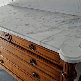 Beautiful French Louis XV Style Marble top five drawer commode. There are five drawers and it has a lovely brass inlay. It is in good original detailed condition.