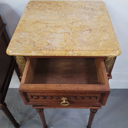 French Oak pair of Louis 16th style marble top bedsides with stunning bronze mounts. They have been sourced from France and are in good original detailed condition.