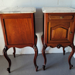 Pair of Louis XV style Walnut bedside cabinets marble top. Circa 1900 and in good original detailed condition.