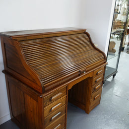 An Antique American Oak Cutler Roll Top Desk