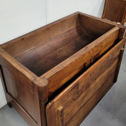 French 19th Century Oak dough bin buffet. The heavy solid top lifts upto reveal a half barrel compartment where traditionally flour and yeast were poured, mixed and proofed to grow into a nice dough. 

Although originally intended for dough this would make an ideally TV cabinet with the two doors opening with plenty of storage.