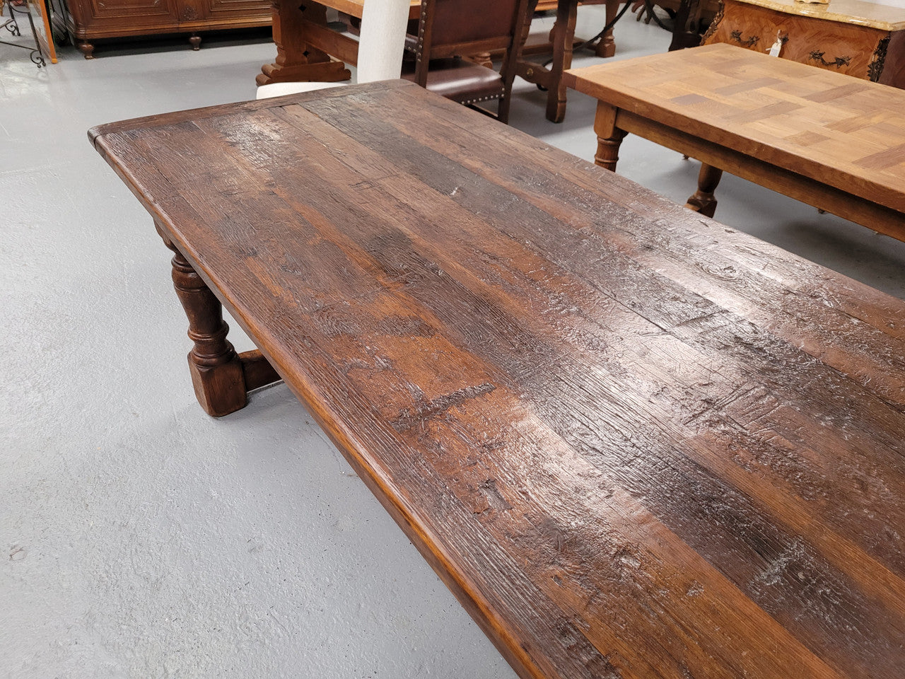 Amazing 2.65 meter French Elm Refectory dining table with loads of rustic charm. This table has been sourced from France and can comfortably seat ten people. It is in good original detailed condition.
