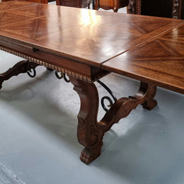 French Spanish style Oak parquetry top extension table. In good original detailed condition.