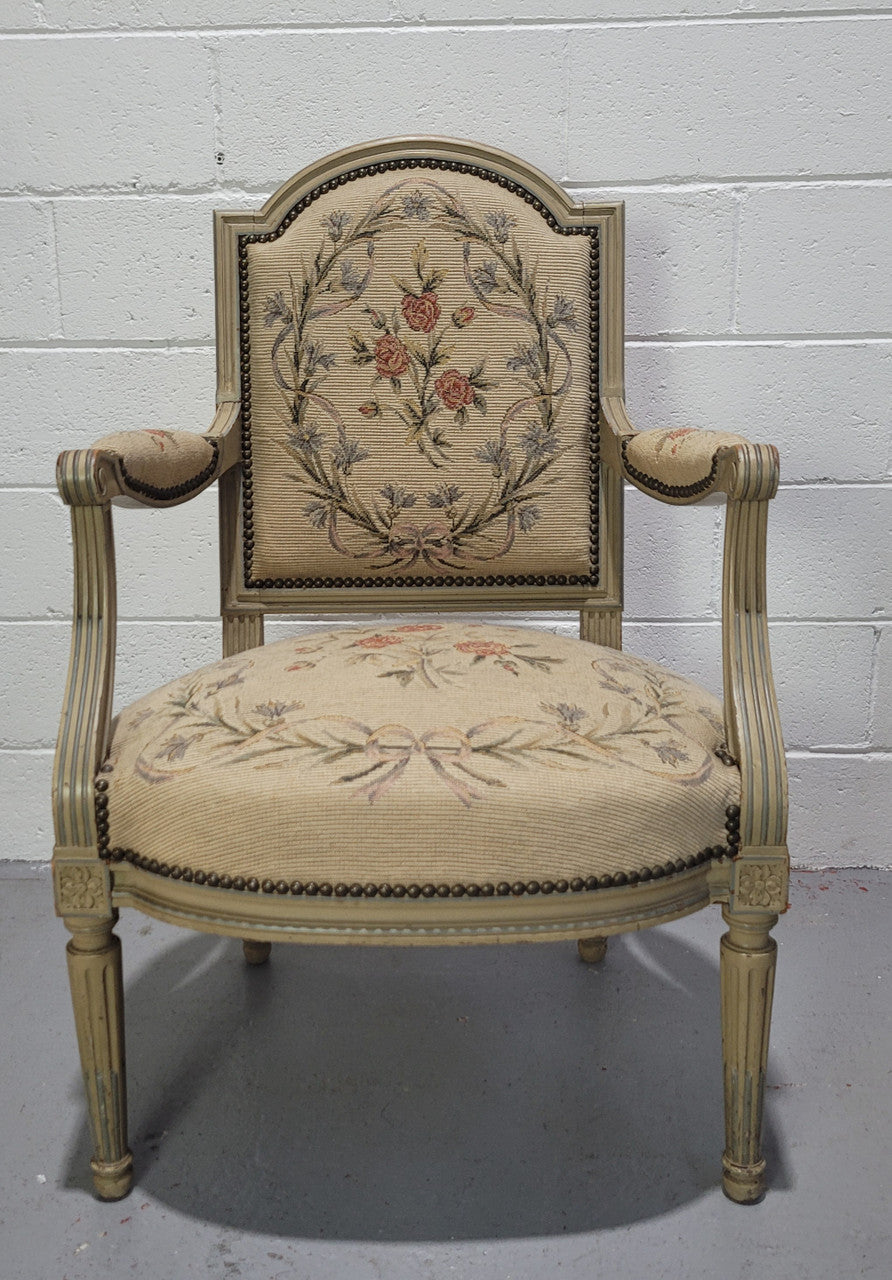 Lovely French  Louis XVI style painted and Tapestry upholstered fauteuil. In good original condition, and very comfortable.