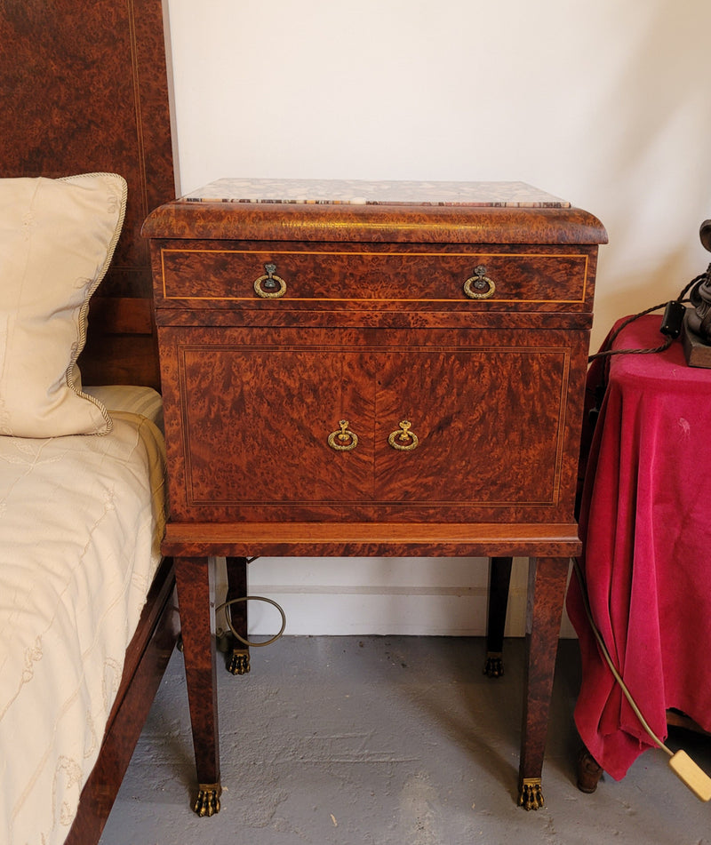 French Art Deco bedroom suite consisting of queen size bed in Amboyna wood and featuring pretty inlay. It comes with a matching pair of bedsides. It is a very stylish and high quality suite. It has been sourced from France and is in good original detailed condition.