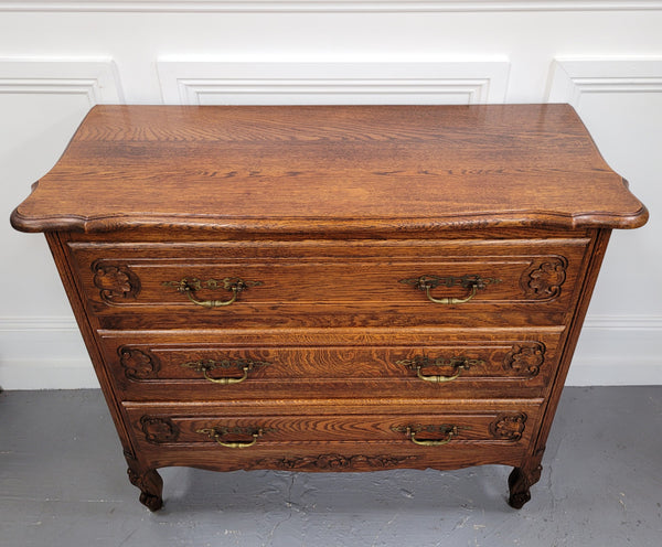 French Louis XV style Oak three drawer chest with wooden top. It has been sourced from France and is in good original detailed condition.