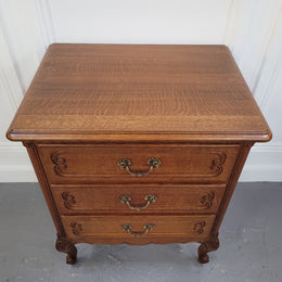 French Oak Louis XV style side drawers with lovely handles and three drawers. It has been sourced from France and is in good original detailed condition.