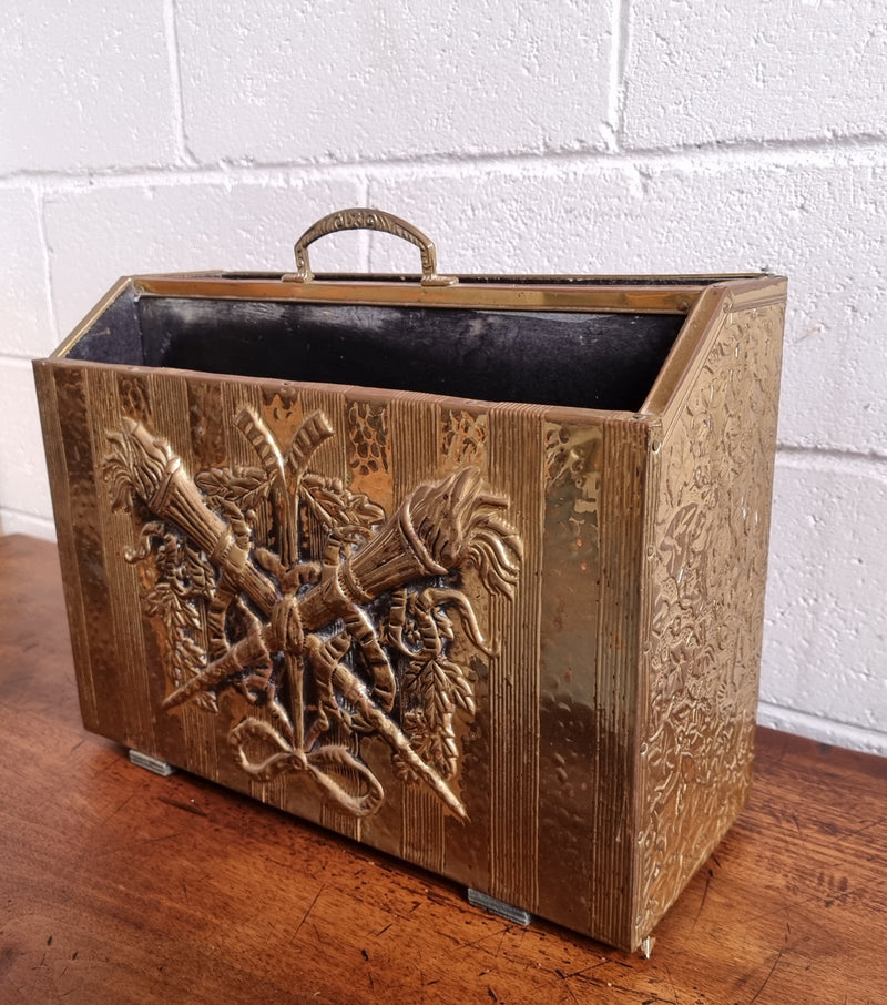 Vintage Brass repousse hammered magazine holder rack. Sourced locally and in good original condition, please view photos as they help form part of the description.