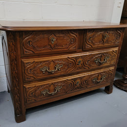 French Cherrywood Louis XIV style wooden topped chest of four drawers. It has been sourced from France and is in good original detailed condition.