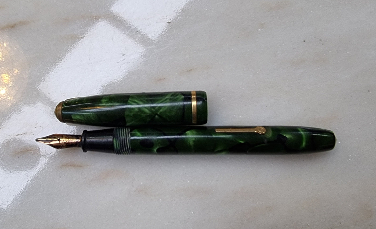 Conway Stewart  "Dinkie" 550 fountain pen green and black marble with 14k gold Nib .