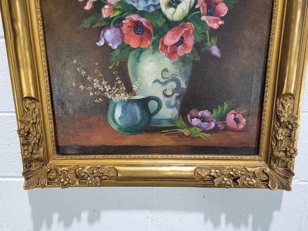 Beautiful French signed oil on canvas painting, depicting floral arrangement in good original gilt frame.