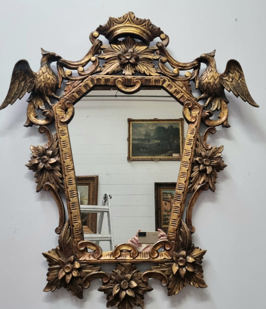 Interesting Italian gilt decorative framed mirror featuring birds. In good original condition.