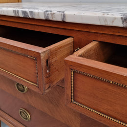 Louis XVI style Mahogany marble top cupboard. It has two drawers at the top and two doors at the bottom all with decorative handles and mounts. Stunning white marble top and all in good original detailed condition.
