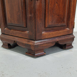 Hexagonal Mahogany enclosed side cabinet with two doors. Would make an ideal side cabinet and is in good restored condition.