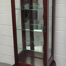 Vintage Mahogany petite display cabinet with three solid glass shelves. Ideal for a small area and is in good original detailed condition.