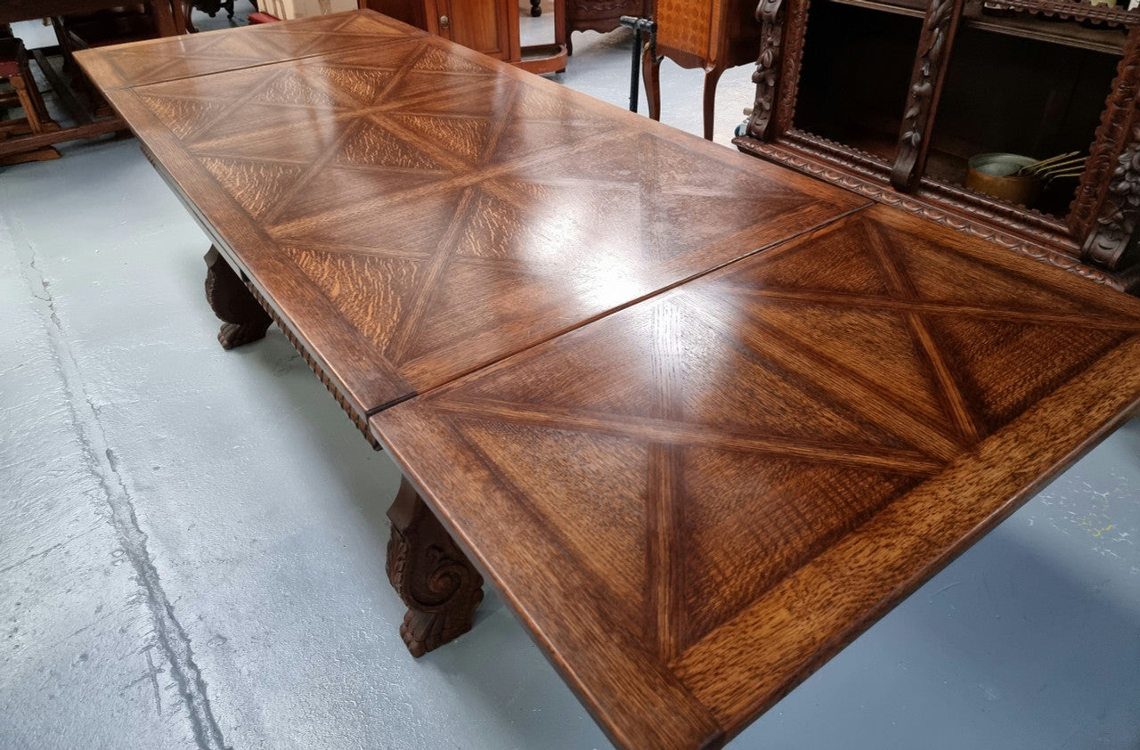 French Spanish style Oak parquetry top extension table. In good original detailed condition.