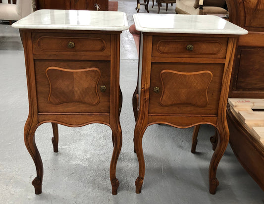 A beautiful pair of French walnut, marble top bedsides with a drawer and cupboard in good condition.
