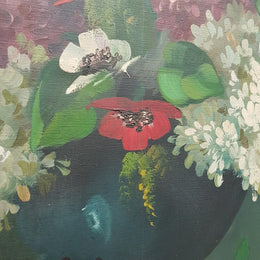 An Antique framed floral painting of lilacs in a vase on canvas, signed and in fantastic original condition.