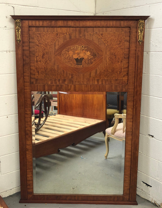 Beautiful Amboyna and Walnut Trumeau mirror. Has lovely parquetry inlay and is in good original condition.