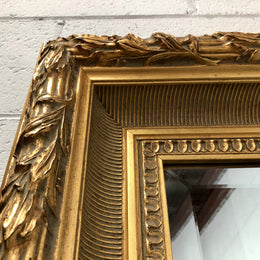 Very large French style mirror with beveled glass. In very good original condition.