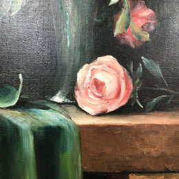 Charming oil painting of roses, signed and beautifully framed. In good original condition.