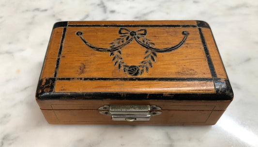 Victorian trinket box engraved with decoration . Is in good original condition.