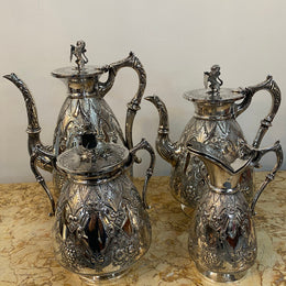 Amazing Quality Sheffield Plate Tea & Coffee Service By Walker & Hall
Gorgeous heavy quality Sheffield plate, tea & coffee service with lion finials.
The set is of the highest quality & has beautiful fine chasing & repoosse work. In very good original condition
