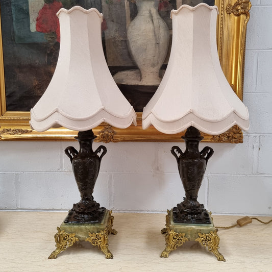 Pair of decorative Antique French gilt bronzed metal and marble table lamps. In good original detailed working condition.