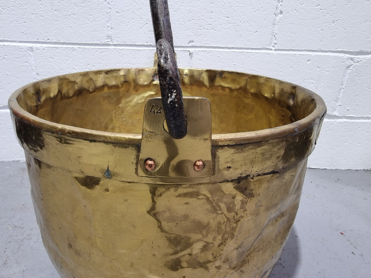 Antique French brass firewood handled bucket. In good original detailed condition.