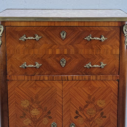 Lovely French Louis XV style Mahogany marquetry inlaid two door side cabinet. It has a beautiful coloured brass bound marble top in good original detailed condition.