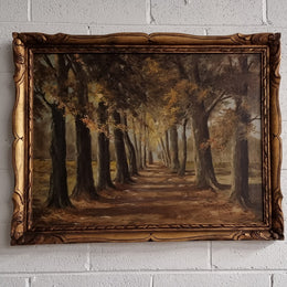 French signed oil on canvas depicting a charming landscape scene in a decorative gilt frame. It is in good original detailed condition and has been sourced from France.