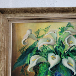Signed and sourced in France a vintage oil on board still life of white lillie's in vase. In a beauitufl frame and it is in good original detailed condition.