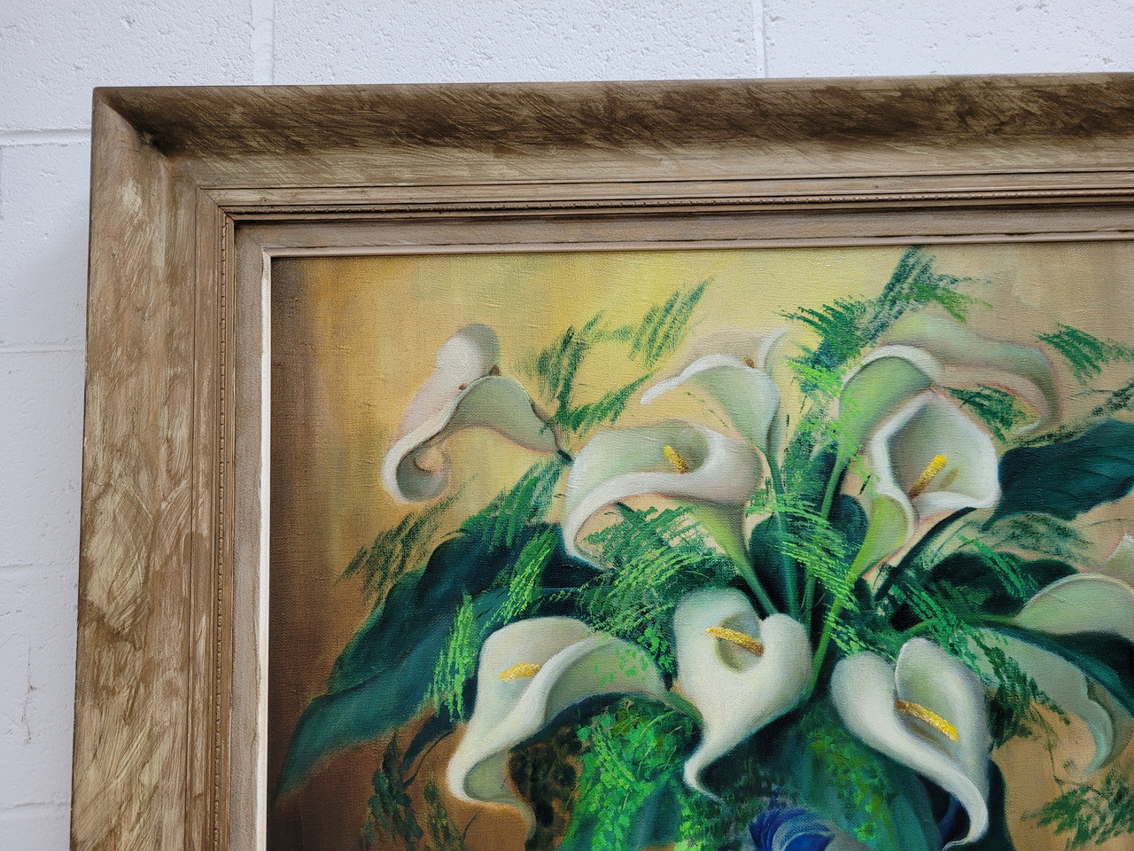 Signed and sourced in France a vintage oil on board still life of white lillie's in vase. In a beauitufl frame and it is in good original detailed condition.