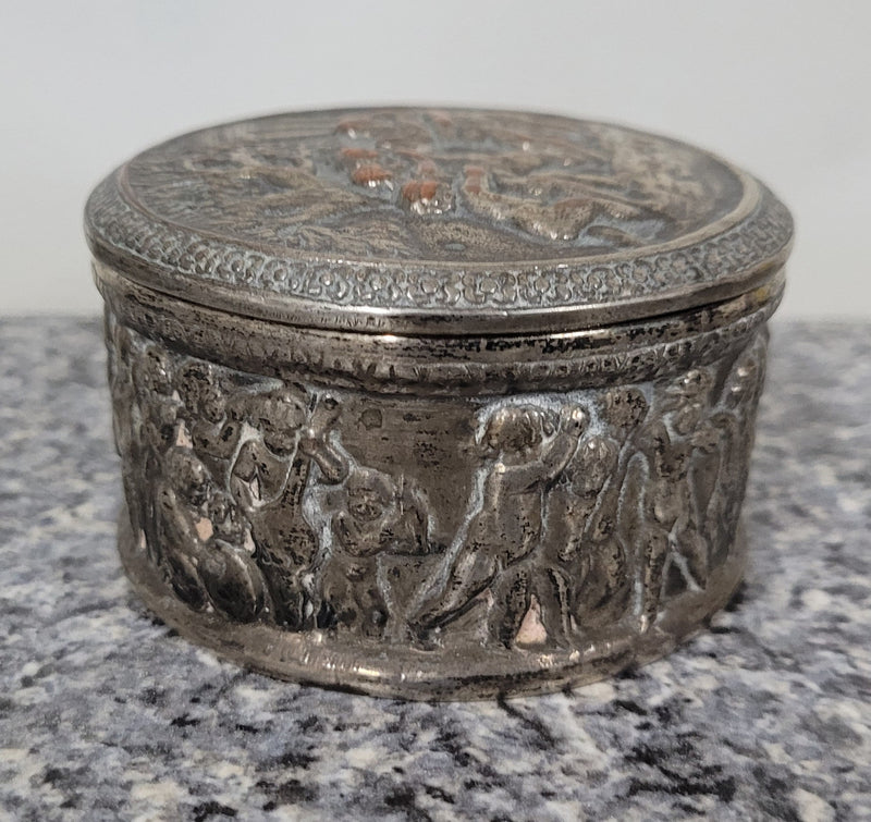 Unusual Antique silver over pottery Italian trinket box nicely decorated with Cherubs. It is in good original condition, please view photos as they help form part of the description.