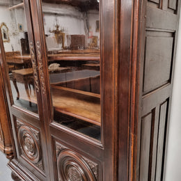 Substantial French Henry 2nd Walnut two door bookcase. It has five fully adjustable shelves and has been sourced from France. It is in good original detailed condition.