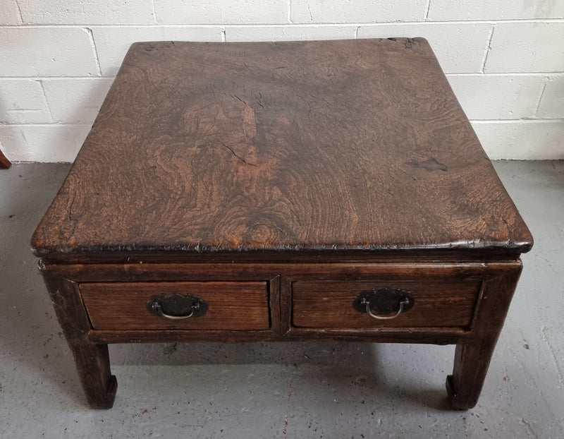 Square Elm coffee table with oriental legs and two long drawers.  Beautifully finished and in good original condition. It has been sourced from France.